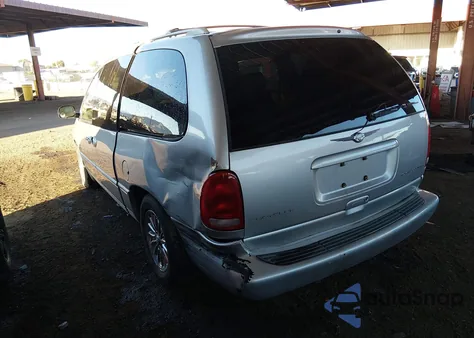 1999 Chrysler Town & Country Limited z USA, uszkodzony, nr VIN 1C4GP64L8XB916537